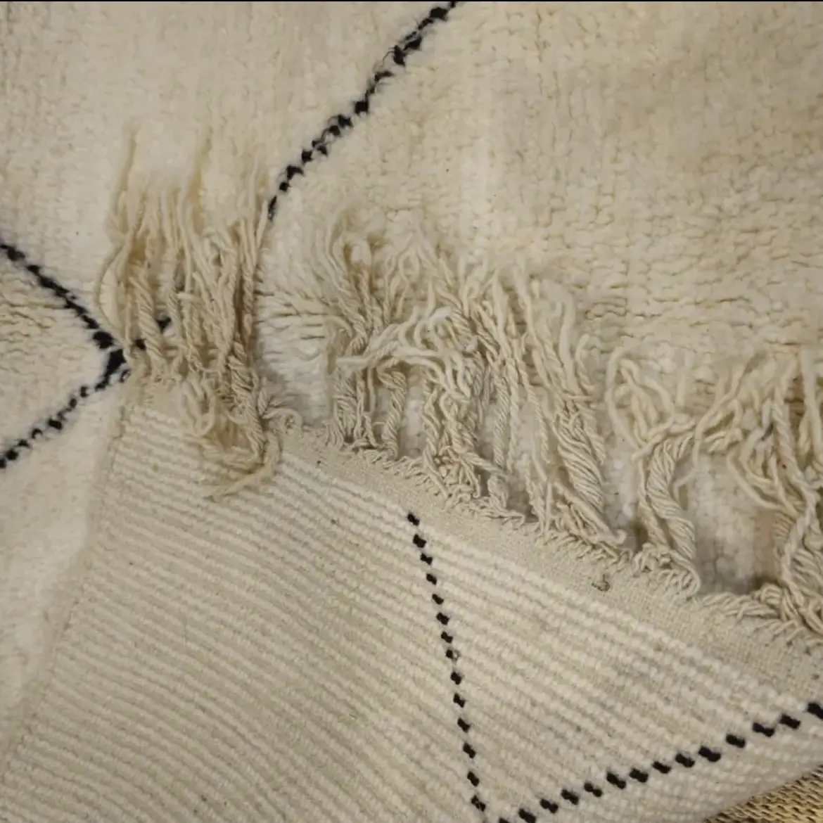 Elegance and Berber craftsmanship come together in this Beni Ourain rug. A wool Berber rug that will enhance your space with its authentic design