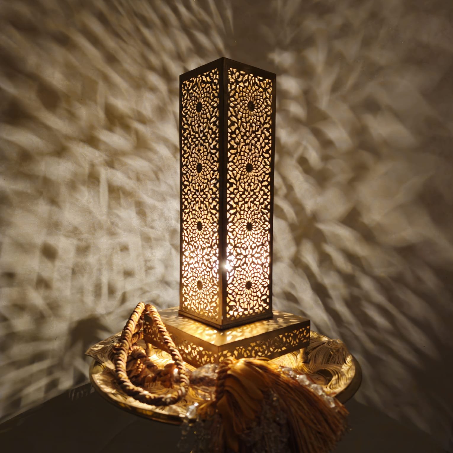 Handcrafted floor brass lamp featuring intricate Moroccan designs, providing a soft, warm glow to enhance your home’s decor with exotic elegance.