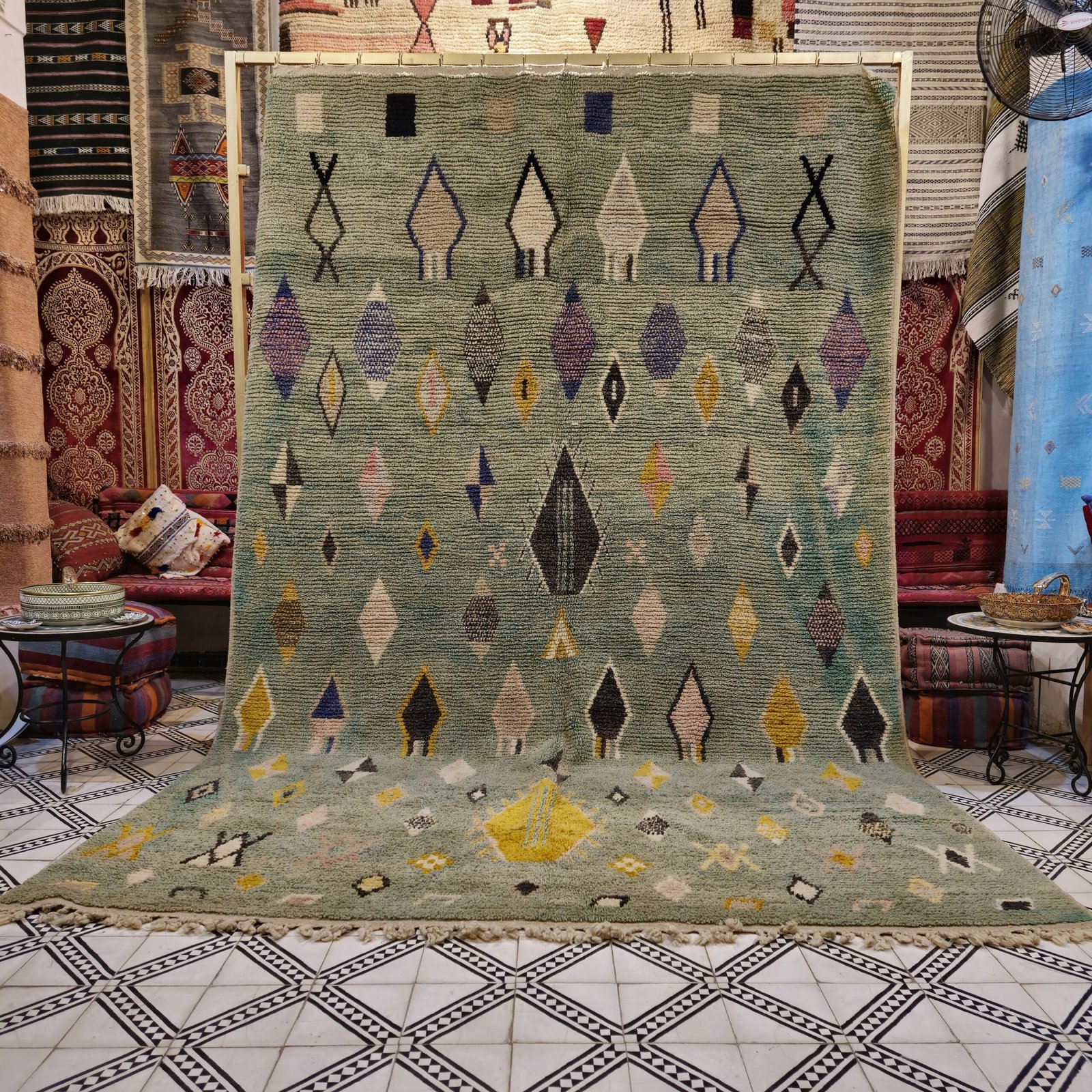 Handmade vintage rug with vibrant, intricate patterns in rich colors, measuring 137" x 78". The hand-knotted design showcases artisanal craftsmanship and adds warmth and character to any space
